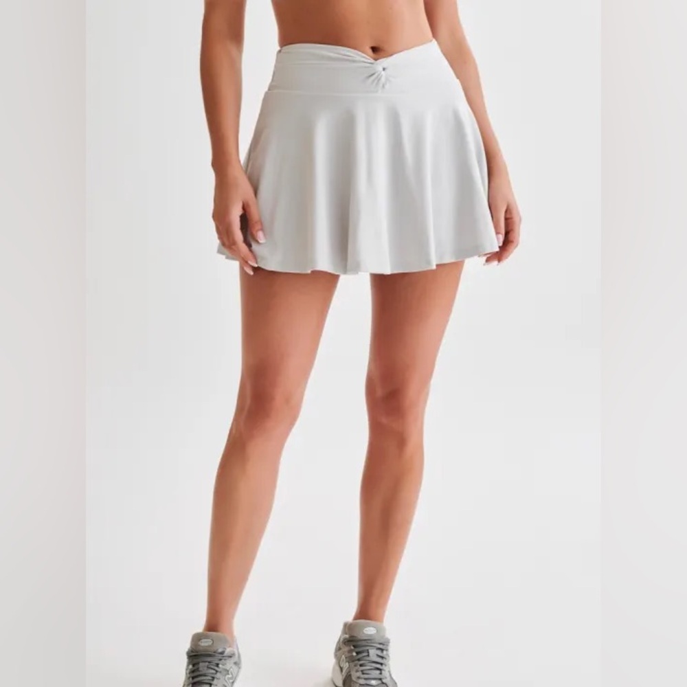 MESHKI Athleisure New Ice Grey Lilah Twist Athletic Mini Skirt Size M